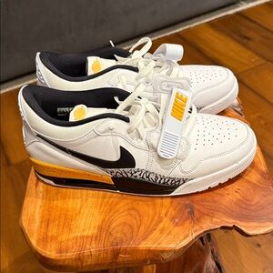 Jordan 312 White and Black Sneakers with Yellow Accents